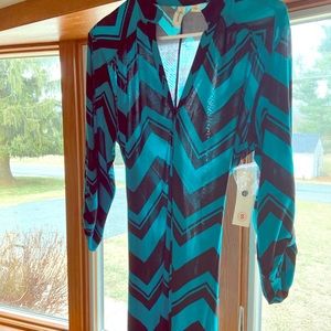 Wrap dress. Brand new. Never worn